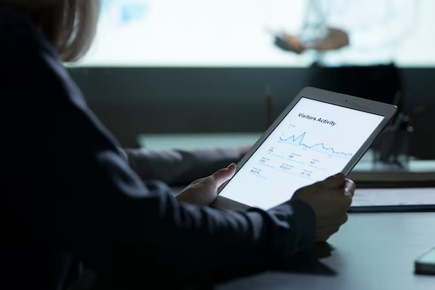 Girl reading data on a tablet