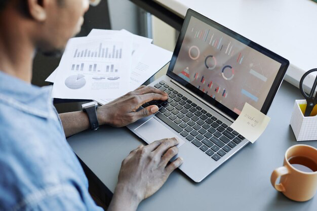 Man manages data using computer